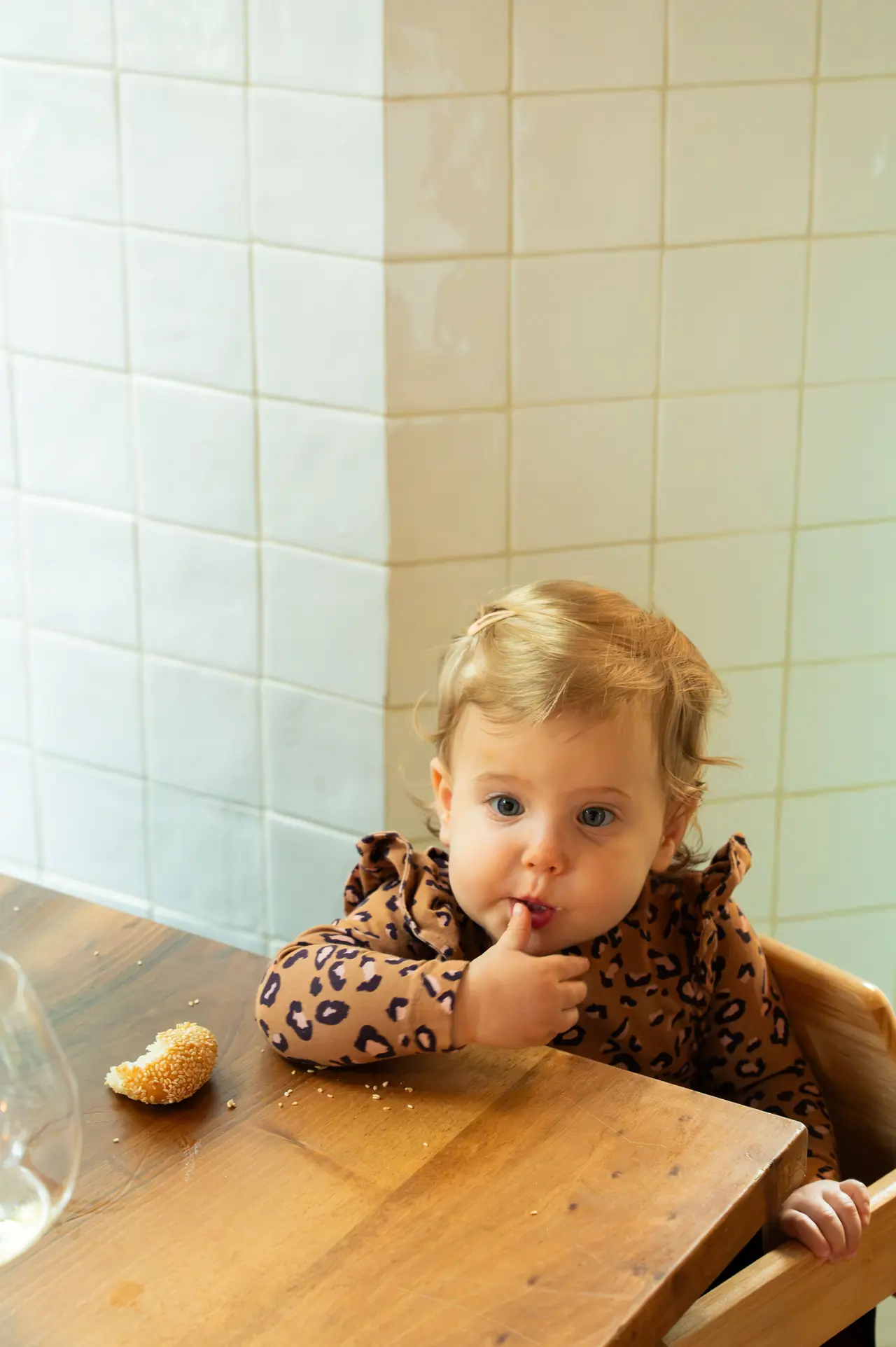 A toddler in a high chair