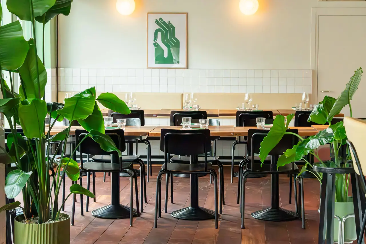 The small room with plants, seats up to 28