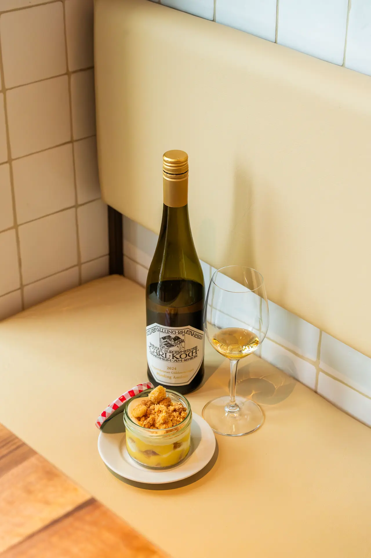 A dessert with a glass of dessert wine