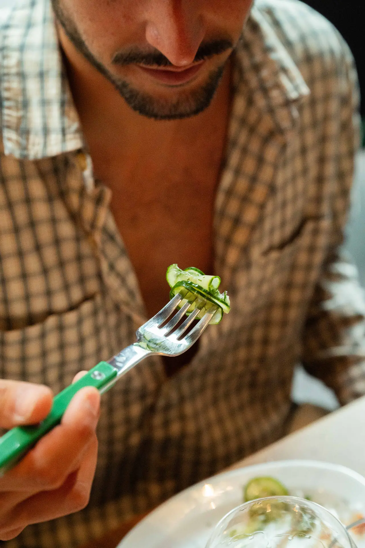 A forkful of herb salad